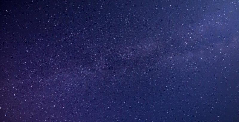 Starry Night Sky with Shooting Star